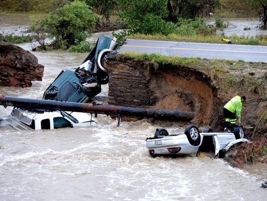 A bridge collapsed after flash flooding in the Front Range of Colorado (Broomfield, CO, Sept. 12, 2013) Photo: Cliff Grassmick, AP