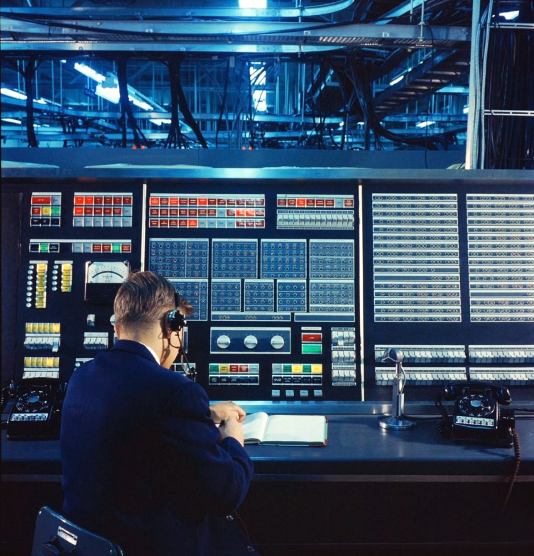 IBM employee working on the AN/FSQ-7 Maintenance Console of the SAGE System, the first computerized air surveillance system developed against Soviet attacks, 1957.
