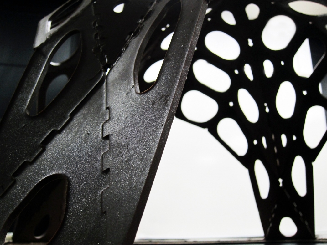 A close-up of a prototype shell structure made from ¼ inch thick chocolate pieces. Project by Alex Jordan, Sigrid Adriaenssens, Axel Kilian. Photo by Axel Kilian.
